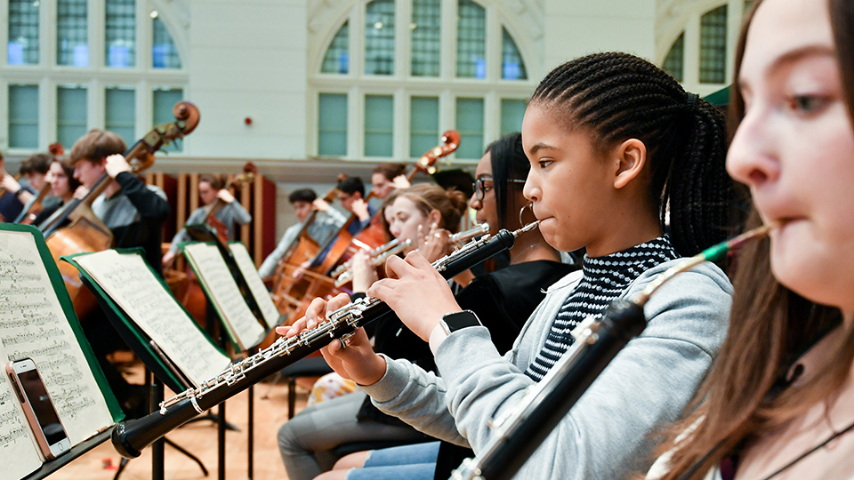 RCMJD oboist in orchestral rehearsal